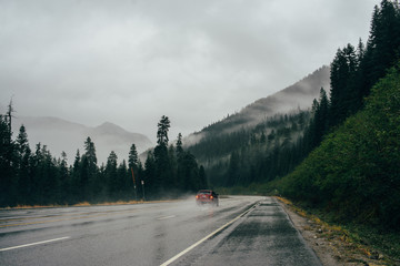 The car is driving on a foggy road © Александра Вишнева