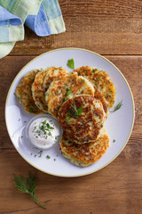 Herb and Cheese Mashed Potato Cakes. Potato Pancakes. Vegetable fritters. View from above, top studio shot