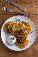 Herb and Cheese Mashed Potato Cakes. Potato Pancakes. Vegetable fritters. View from above, top studio shot