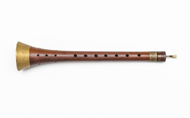 Zurla. Isolated image of traditional Serbian woodwind musical instrument.
