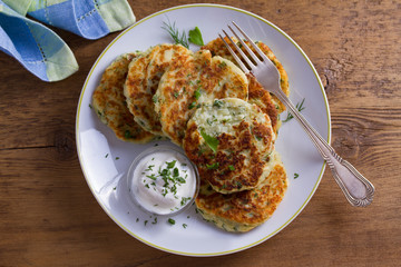 Herb and Cheese Mashed Potato Cakes. Potato Pancakes. Vegetable fritters. View from above, top studio shot
