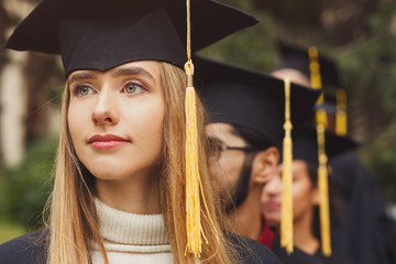 Young serious woman on her graduation day