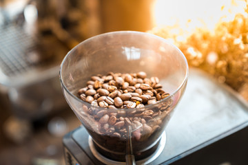 Epresso coffee bean in coffee machine jar. Vintage style