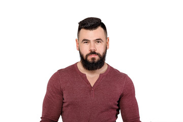 Obraz premium young serious bearded man isolated on white background