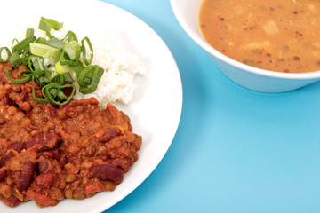 Indian legume hash with rice on a blue