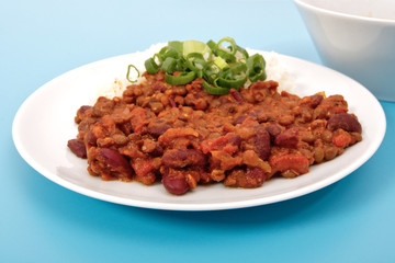 Indian legume hash with rice on a blue