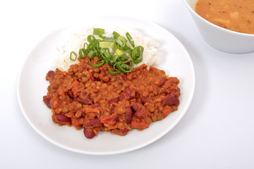 Indian legume hash with rice on a white