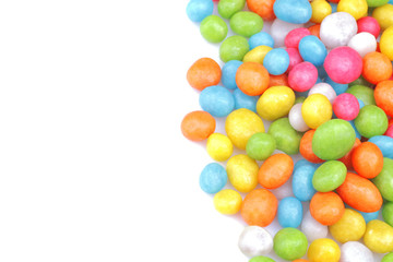 Fototapeta na wymiar Multicolored round candy on a white background. Top view. Isolated.