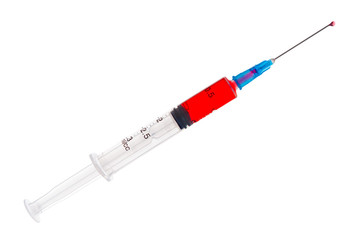 Syringe with red liquid isolated on white background