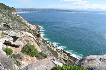 Fototapeta premium Wonderful landscape with the blue beach at the hiking trail at Robberg Nature Reserve in Plettenberg Bay, South Africa