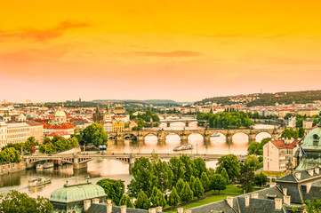 Viewing on Vltava river and Prague cityscape. Toned image