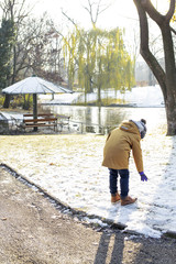 boy playing with snow