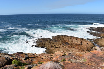 Wonderful landscape with the blue beach at the hiking trail at Robberg Nature Reserve in Plettenberg Bay, South Africa