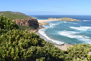 Wonderful landscape with the blue beach at the hiking trail at Robberg Nature Reserve in Plettenberg Bay, South Africa