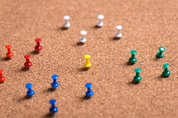 push pins on cork board