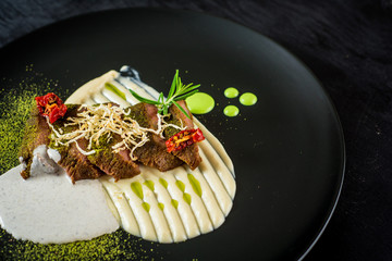 Grilled meat with sauce and spices