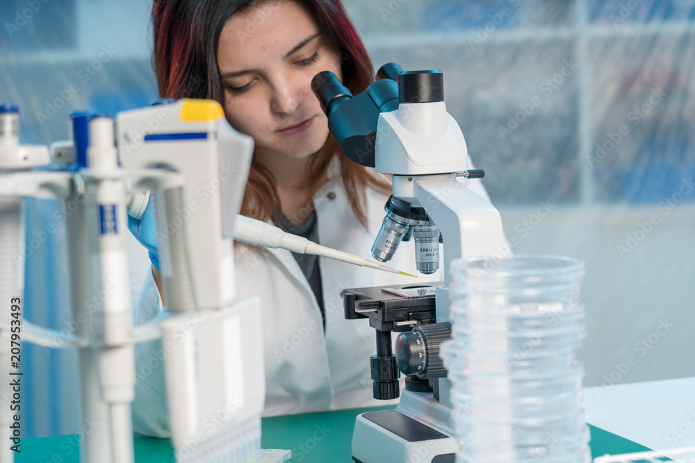 Sticker woman technician with multipipette in genetic laboratory pcr research. student girl use pipette.