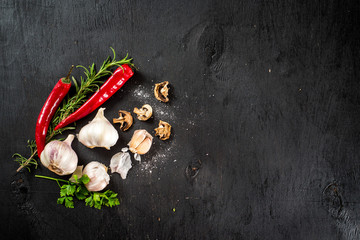 Food ingredients flatlay on black. Copy space