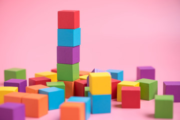 Obraz premium Colorful stack of wood cube building blocks