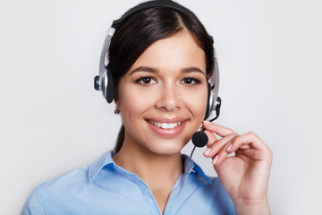 customer support phone operator in headset, with blank copyspace area for slogan or text message,...
