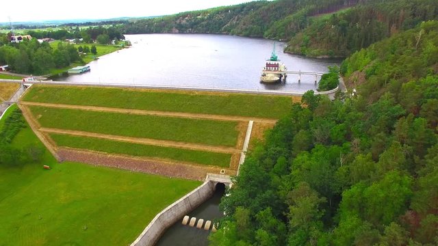 The Hracholusky dam with water power plant. The water reservoir on the river Mze. Source of renewable energy and popular recreational area in Western Bohemia. Czech Republic, Europe.