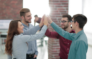 Business people  giving five after signing agreement or contract