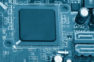 Electronic components are mounted on the device board Chips diodes capacitors chokes Close-up