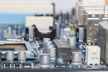 Electronic components are mounted on the device board Chips diodes capacitors chokes Close-up