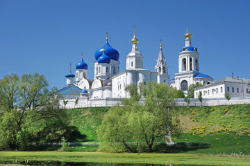 Fototapeta na wymiar Summer view of Architectural ensemble Holy Bogolubsky Women's Monastery, Bogolubovo, Vladimir , Golden Ring of Russia.