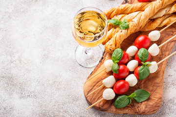 Caprese skewers and grissini bread