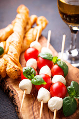 Caprese skewers and grissini bread