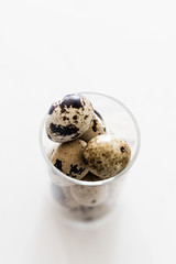 Quail Eggs in Glass Container