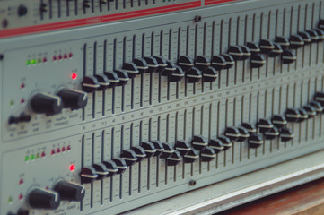 Equalizer adjusting Sound recording studio mixing desk