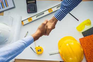 Architects who work with blueprints, inspecting workplace engineers for architectural planning,...