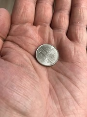 Coin in hand. One ruble of the Republic of Belarus