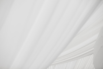 Fototapeta na wymiar white fabric ceiling tulle