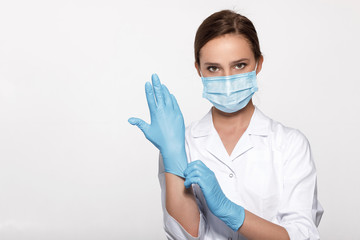 doctor wearing mask and gloves