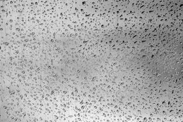 Obraz premium black and white image, water droplets on the surface