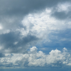Beautiful clouds slowly flying in the sky.