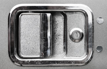 Close up of exterior chrome semi truck door handle