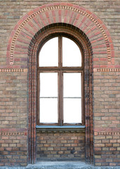 An old wooden window in a brick wall. Window on white isolated background