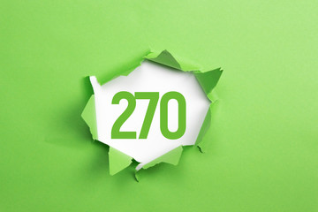 gruene Nummer 270 auf gruenem Papier