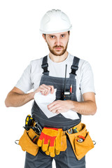 A builder or worker in a protective helmet breaks the contract that he holds in front of him....
