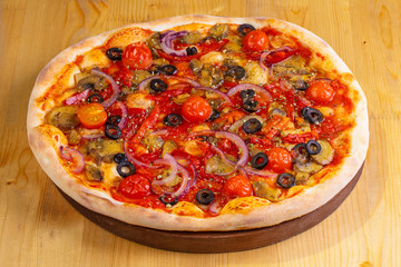 Pizza with mushrooms and tomatoes