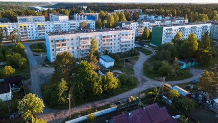 Bird's eye view of houses in urban-type settlement Nikolskiy in Leningrad region, Russia.