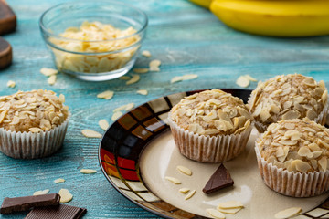 Tasty sugar muffins with almond, walnuts and chocolate
