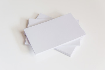 Stack of blank white business cards. Mockup business cards on white background with clipping path