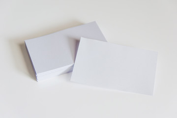 Stack of blank white business cards. Mockup business cards on white background with clipping path