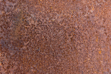 Brown rust stains texture of the old white paint on rusty metal wall. Rusty metal background.