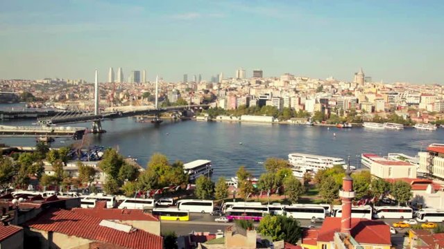 roof Valide Khan, Galata Bridge and Yeni Cami The New Mosque in Istanbul, Turkey.